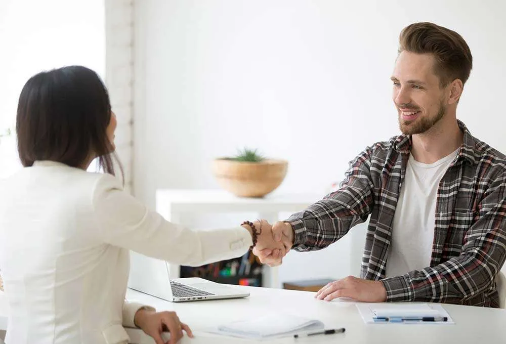 Two people shaking hands