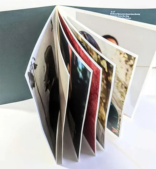 Lookbook Brochure standing up on table